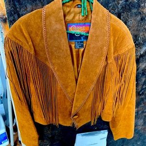 Fringe suede jacket says large fits like medium